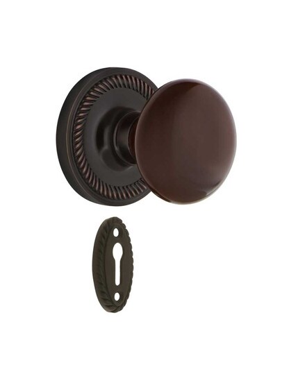 Rope Rosette Mortise-Lock Set with Brown Porcelain Knobs in Timeless Bronze.